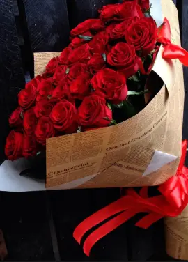 Roses in newspaper