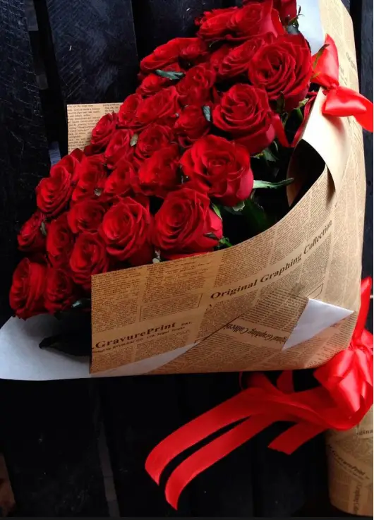Roses in newspaper