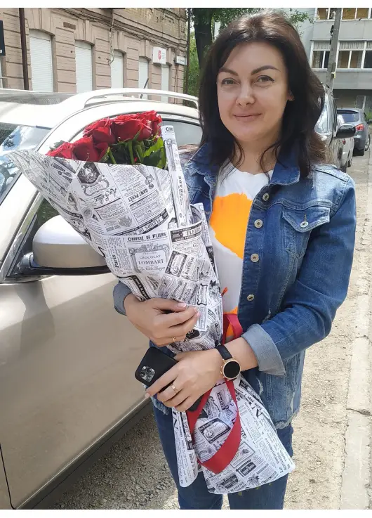 Roses in newspaper