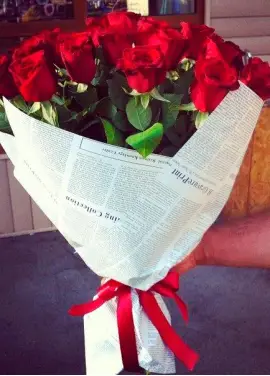 Roses in newspaper