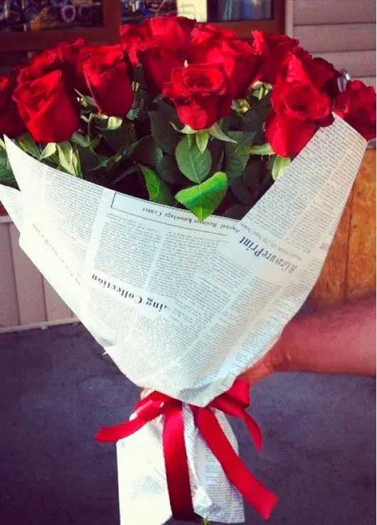 Roses in newspaper