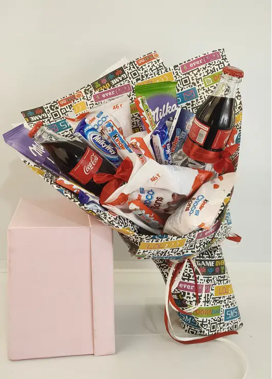 Coca Cola and a bouquet of sweets